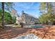 Two story house exterior with a pool and a fenced backyard at 5955 Tibor Nw Dr, Acworth, GA 30101