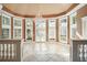 Sunroom with vaulted ceiling, lots of windows, and a chandelier at 5955 Tibor Nw Dr, Acworth, GA 30101