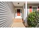 Inviting front entrance with red door and stone walkway at 2804 Sterling Dr, Lawrenceville, GA 30043