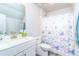 Clean bathroom with white vanity and butterfly shower curtain at 51 Riverbirch Way, Dallas, GA 30157