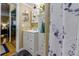 Updated bathroom with a vanity and shower/tub combo at 220 Renaissance Pkwy # 1321, Atlanta, GA 30308