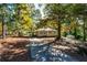 Ranch home with carport and mature trees at 6055 Blackhawk Se Trl, Mableton, GA 30126