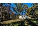 House exterior showcasing a side view and wooded setting at 6055 Blackhawk Se Trl, Mableton, GA 30126