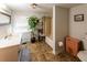 Clean bathroom with a bathtub, shower, and tiled flooring at 6055 Blackhawk Se Trl, Mableton, GA 30126