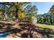 House exterior with a view of the backyard and surrounding trees at 6055 Blackhawk Se Trl, Mableton, GA 30126