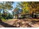 Ranch style home with carport and mature trees at 6055 Blackhawk Se Trl, Mableton, GA 30126
