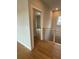 Hardwood floor hallway with access to bedrooms at 2757 Wynberry Se Ln, Atlanta, GA 30339