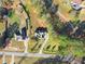 Aerial view showing house and large lot at 7210 Wallace Tatum Rd, Cumming, GA 30028