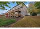 Row of townhouses with multiple levels of wooden decks at 1142 Laurel Valley Ct, Buford, GA 30519