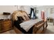 Main bedroom featuring a large bed and plush bedding at 143 Templeton Ln, Villa Rica, GA 30180
