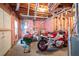 Unfinished basement with a motorcycle and lawnmower at 143 Templeton Ln, Villa Rica, GA 30180