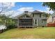 Gray house with screened porch and deck, spacious backyard at 143 Templeton Ln, Villa Rica, GA 30180