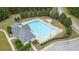 Community lap pool with adjacent clubhouse at 143 Templeton Ln, Villa Rica, GA 30180