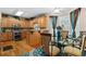 Eat-in kitchen with granite countertops, stainless steel appliances, and wood flooring at 143 Templeton Ln, Villa Rica, GA 30180