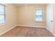 Charming bedroom with neutral walls and plush carpeting at 1788 Danrich Dr, Decatur, GA 30032