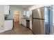 Updated kitchen with white cabinets, granite counters and stainless steel appliances at 1788 Danrich Dr, Decatur, GA 30032