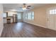 Open living area with hardwood floors, kitchen, and ceiling fan at 1788 Danrich Dr, Decatur, GA 30032