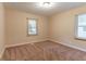 Spacious bedroom with neutral carpeting and large windows at 1788 Danrich Dr, Decatur, GA 30032