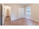 Bright bedroom with neutral carpeting and double closets at 1788 Danrich Dr, Decatur, GA 30032