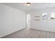 Bedroom with carpet, window, and built-in shelves at 3701 Salvia Dr, Buford, GA 30519