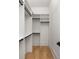 Spacious walk-in closet with ample shelving and hanging space at 1184 Lupo Loop, Chattahoochee Hills, GA 30268