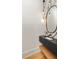 Stylish powder room with floating vanity, oval mirror, and marble accent wall at 1184 Lupo Loop, Chattahoochee Hills, GA 30268