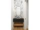 Modern powder room with floating vanity and marble-look tile at 1184 Lupo Loop, Chattahoochee Hills, GA 30268