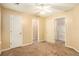 Spacious bedroom with neutral walls and carpet at 4103 Kingship Dr, Ellenwood, GA 30294