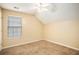 Simple bedroom with carpeted floor and window coverings at 4103 Kingship Dr, Ellenwood, GA 30294