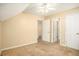 Spacious bedroom with carpet flooring and multiple closets at 4103 Kingship Dr, Ellenwood, GA 30294