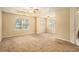 Spacious Primary bedroom with neutral walls and carpet flooring at 4103 Kingship Dr, Ellenwood, GA 30294