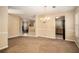 Dining room with view into kitchen and living room at 4103 Kingship Dr, Ellenwood, GA 30294
