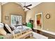 Spacious bedroom with hardwood floors and access to en-suite bathroom at 2034 Gold Leaf Pkwy, Canton, GA 30114