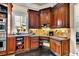 Well-equipped kitchen with granite countertops and custom cabinetry at 2034 Gold Leaf Pkwy, Canton, GA 30114