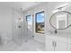 Spa-like bathroom with marble floors and large shower at 555 Versailles Dr, Auburn, GA 30011