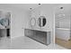 Elegant bathroom with double vanity and access to walk-in closet at 555 Versailles Dr, Auburn, GA 30011