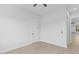 Spacious bedroom with hardwood floors and access to hallway at 555 Versailles Dr, Auburn, GA 30011