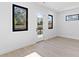 Bedroom with hardwood floors and access to private deck at 555 Versailles Dr, Auburn, GA 30011