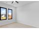 Light-filled bedroom with hardwood floors and large windows at 555 Versailles Dr, Auburn, GA 30011