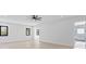 Spacious bedroom with hardwood floors and an ensuite bathroom at 555 Versailles Dr, Auburn, GA 30011