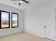 Bright bedroom with hardwood floors and large windows at 555 Versailles Dr, Auburn, GA 30011