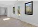 Bright bedroom with hardwood floors and access to another room at 555 Versailles Dr, Auburn, GA 30011