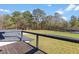 Deck overlooking backyard with treed views and privacy at 555 Versailles Dr, Auburn, GA 30011