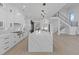 Open concept kitchen with marble island and stainless steel appliances at 555 Versailles Dr, Auburn, GA 30011