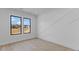 Spacious office with hardwood floors, large windows, and an adjacent room at 555 Versailles Dr, Auburn, GA 30011