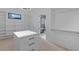 Large walk-in closet with built-ins and en-suite bathroom access at 555 Versailles Dr, Auburn, GA 30011