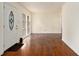 Inviting entryway with hardwood floors and a view into the living room at 2070 Brannen Se Rd, Atlanta, GA 30316