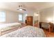 Two twin beds in a bright bedroom with hardwood floors at 742 Mountainbrooke Cir, Stone Mountain, GA 30087