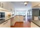 Modern kitchen with white cabinets and stainless steel appliances at 742 Mountainbrooke Cir, Stone Mountain, GA 30087