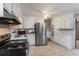 Bright kitchen with stainless steel appliances and white cabinets at 3766 Citation Dr, Decatur, GA 30034